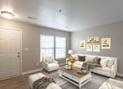 Thumbnail 3 of 12 - a living room with grey walls and white furniture