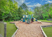 Thumbnail 21 of 23 - Playground Area at Bay Crossings  Apartments, Bay St. Louis, MS, 39520