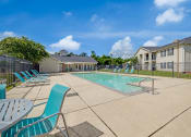 Thumbnail 20 of 23 - Exterior Pool at Bay Crossings  Apartments, Bay St. Louis, MS, 39520