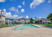 Thumbnail 19 of 23 - Exterior Pool at Bay Crossings  Apartments, Bay St. Louis, MS, 39520