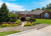 Thumbnail 1 of 19 - a house with a flag in front of it at Valley View Estates, Council Bluffs, 51503