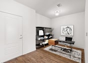 Thumbnail 6 of 23 - A work room / private study with hardwood floors and a storage closet  at Mirabelle Luxury Apartments, Missouri