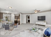 Thumbnail 28 of 59 - a living room with a couch and a table at Stonepost Crossing Apartments, Overland Park, Kansas
