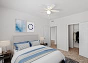 Thumbnail 20 of 57 - A bedroom with a ceiling fan and large walk in closet. at Crescent Apartment Homes, Lenexa, Kansas