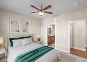 Thumbnail 22 of 50 - a bedroom with a bed and a ceiling fan at The Dorset, Kansas City, MO