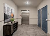 Thumbnail 50 of 50 - Interior hallway at The Dorset with elevator access and nearby apartment doors