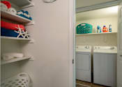 Thumbnail 6 of 9 - A laundry room with a washer and dryer connections and linen closet