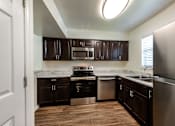 Thumbnail 3 of 9 - Renovated Kitchen at Fords Pointe Apartments and Townhomes Savannah GA