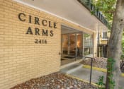 Thumbnail 3 of 37 - a brick building with the words arms on the side