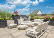 Thumbnail 34 of 37 - the patio on the roof of the building has a view of the city
