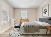 Thumbnail 11 of 22 - a bedroom with a bed and two windows