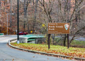 Thumbnail 17 of 22 - a sign park on the side of a road