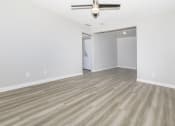 Thumbnail 5 of 20 - the living room and dining room of an empty apartment