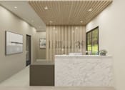 Thumbnail 23 of 37 - A reception area with a marble counter and a framed picture on the wall.