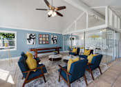 Thumbnail 26 of 38 - blue chairs in leasing office