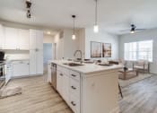Thumbnail 3 of 65 - the preserve at ballantyne commons apartment kitchen and living room