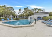 Thumbnail 20 of 33 - our resort style swimming pool is next to our clubhouse and has lounge chairs around it
