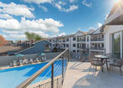Thumbnail 18 of 29 - a balcony with a pool and tables and chairs