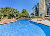 Thumbnail 6 of 29 - the swimming pool at the falls at rolland park apartments