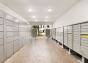 Thumbnail 33 of 37 - a row of lockers in a hallway with a building in the background