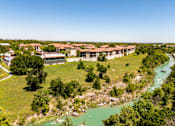 Thumbnail 61 of 62 - an aerial view of the resort and river