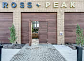 Thumbnail 29 of 29 - A building with a sign that says Ross + Peak.