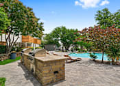 Thumbnail 13 of 19 - a backyard with a pool and a barbecue grill