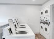 Thumbnail 41 of 43 - the preserve at ballantyne commons apartment laundry room with washer and dryer