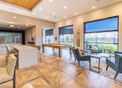 Thumbnail 27 of 33 - a resident clubhouse with a pool table and bar