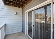 Thumbnail 31 of 31 - A white door with a glass window is open.