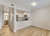 Thumbnail 8 of 28 - a kitchen and living room in a 555 waverly unit