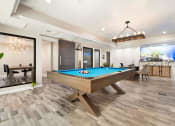 Thumbnail 32 of 37 - the pool table in the clubhouse at the preserve at great pond apartments in windsor