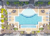 Thumbnail 18 of 22 - a rendering of an aerial view of a swimming pool with trees and umbrellas