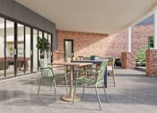 Thumbnail 31 of 37 - A patio with a table and chairs is shown.