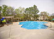 Thumbnail 12 of 29 - the swimming pool at the apartments for rent