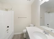 Thumbnail 12 of 28 - a bathroom with a sink toilet and shower