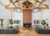 Thumbnail 8 of 18 - a rendering of a living room with couches and chairs in front of a fireplace