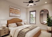 Thumbnail 3 of 16 - A bedroom with a large bed, a ceiling fan, and a painting on the wall.