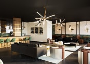 Thumbnail 1 of 24 - a room filled with furniture and a large window