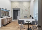 Thumbnail 21 of 32 - an office with a desk and chairs and a wall with a tv