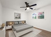 Thumbnail 8 of 10 - a bedroom with a bed and a ceiling fan