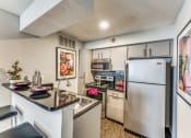 Thumbnail 2 of 16 - our spacious kitchen with stainless steel appliances and granite counter tops