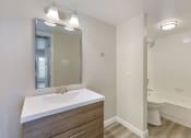 Thumbnail 14 of 28 - a bathroom with a sink and a toilet