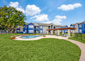Thumbnail 47 of 62 - the preserve at ballantyne commons pool and grass with apartment buildings