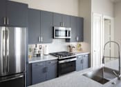 Thumbnail 10 of 43 - oven and stove top view