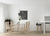 Thumbnail 10 of 19 - A kitchen with a dining table and chairs.