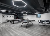 Thumbnail 7 of 35 - A room with a pool table and a ping pong table.