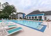 Thumbnail 9 of 31 - our apartments have a large swimming pool with chairs