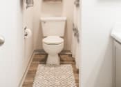 Thumbnail 13 of 34 - a small bathroom with a toilet and a window