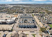 Thumbnail 31 of 40 - A large industrial complex is surrounded by apartment buildings.